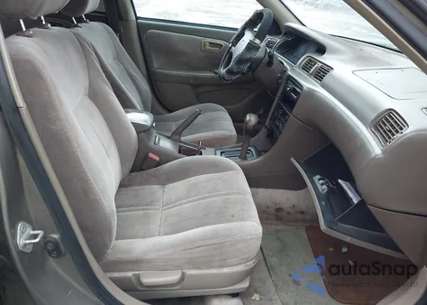 1999 Toyota Camry Le from USA, damaged, VIN 4T1BG22K1XU889078